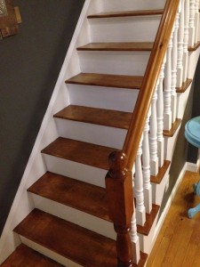We kept the newel post wooden, but you could paint it a contrasting color
