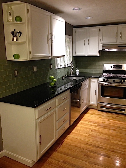 The other half of our kitchen (refinishing the cabinets ourselves made a huge difference)