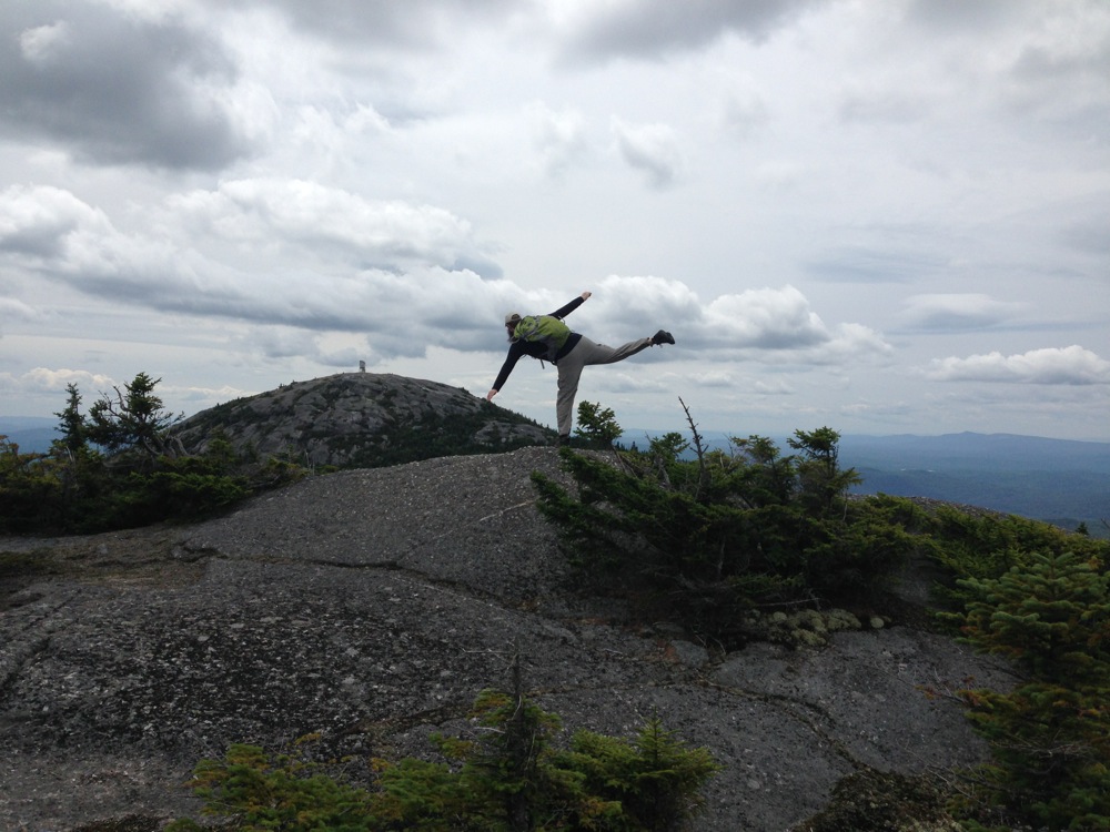 Mr. FW doing yoga on the Mt. Firescrew summit, facing Mt. Cardigan