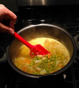 Mr. FW stirs his homemade split pea soup. A great repository for any produce that's wilting!