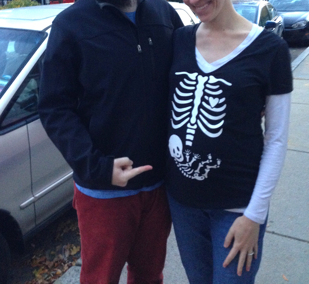 Our Halloween costumes--huge thanks to my sister for handing down the baby momma skeleton ensemble.