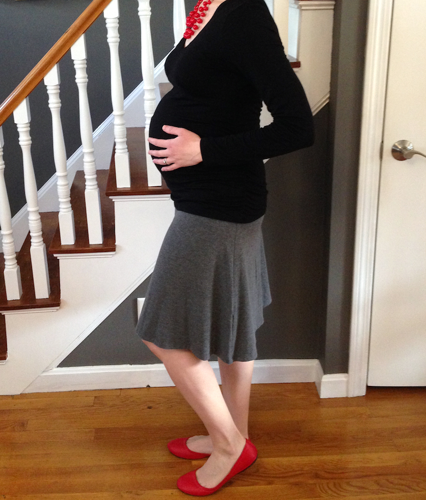 Me at 39 weeks pregnant in my hand-me-down maternity garb