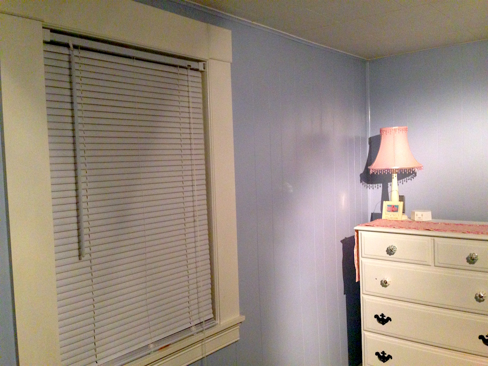 The paper bag window hack is concealed by the blinds