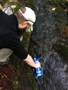 Mr. FW using our water filtration gear on a hike