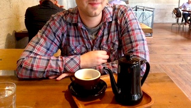 Mr. FW in a coffee shop without a beard... try to restrain your shock